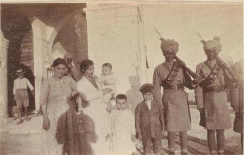 Indian soldiers with Armenian orphans*